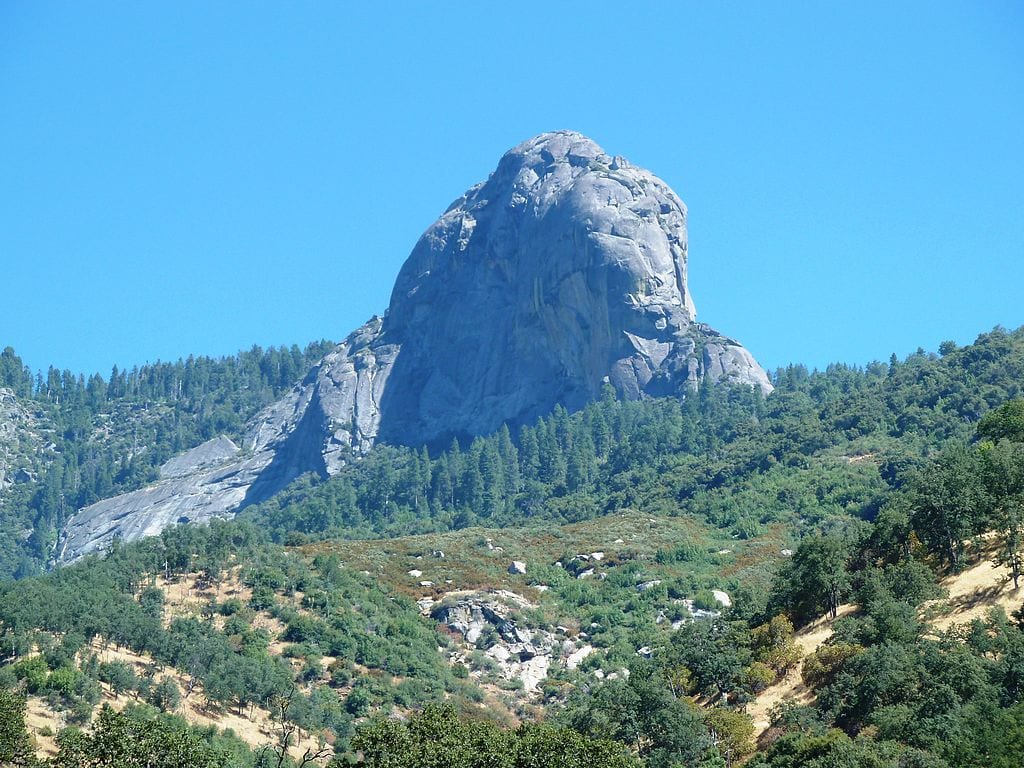 Moro Rock from far away. A staircase is leading to the summit of the rock